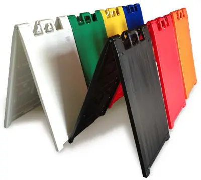 Colorful folding signs arranged in a row.