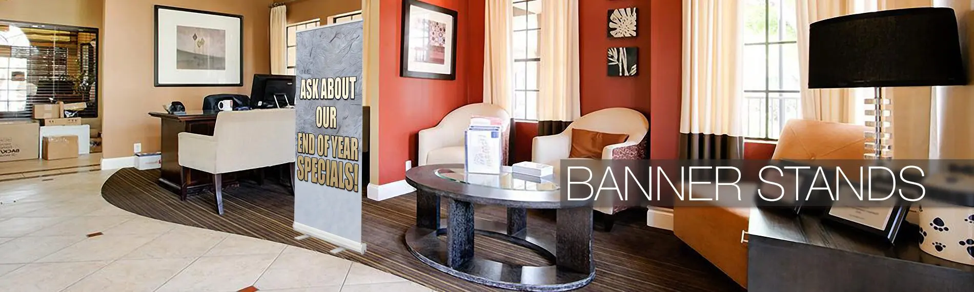 Office lobby with banner stands and seating.