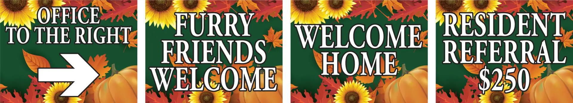 Signs with fall-themed welcome messages.