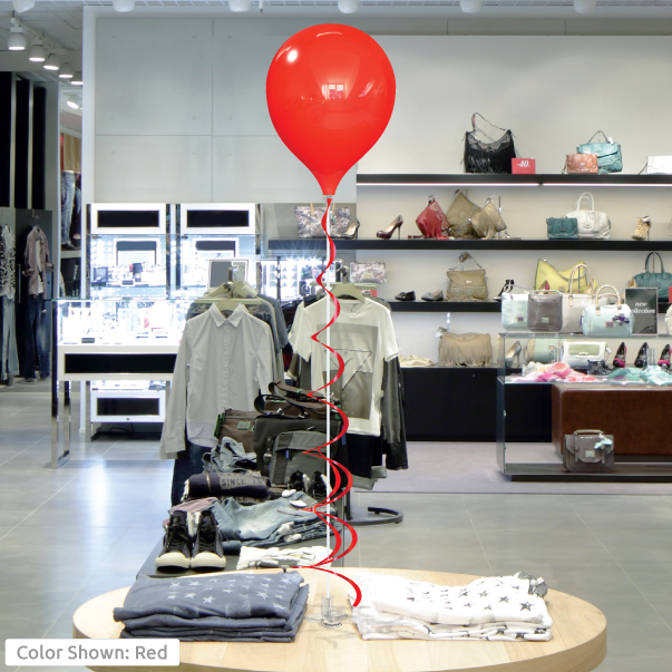 Red balloon in a clothing store display.