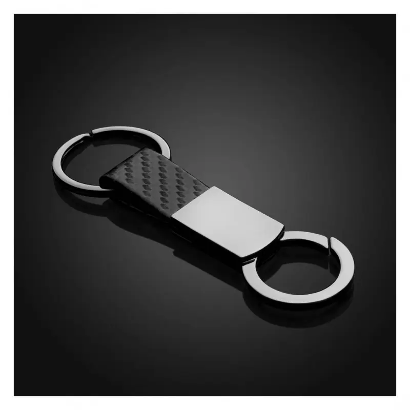 Sleek metal and carbon fiber keychain.