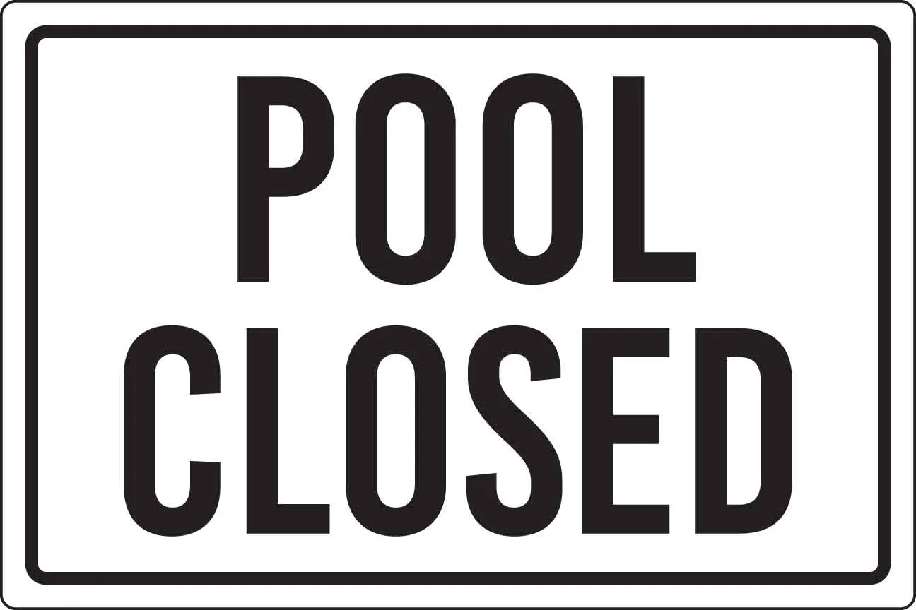 Sign reading 'Pool Closed' in black text.