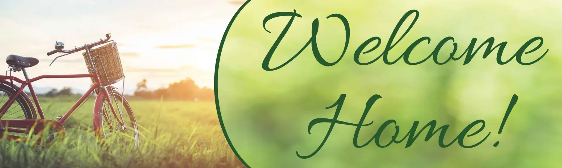 Bicycle on grass, "Welcome Home" text.