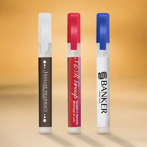 Three branded spray bottles on gradient background.